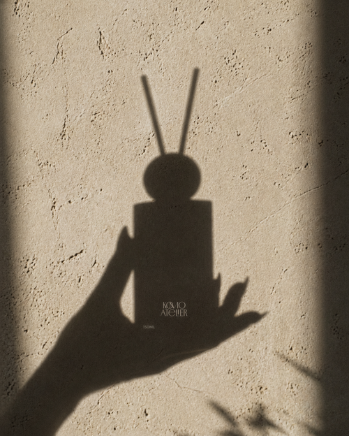 FORM II reed diffuser by Komo Atelier, warm wood cap with black reeds