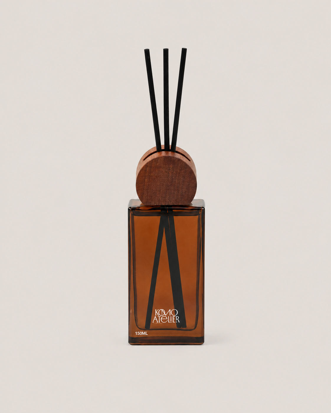 FORM II reed diffuser, architectural amber-tinted glass bottle
