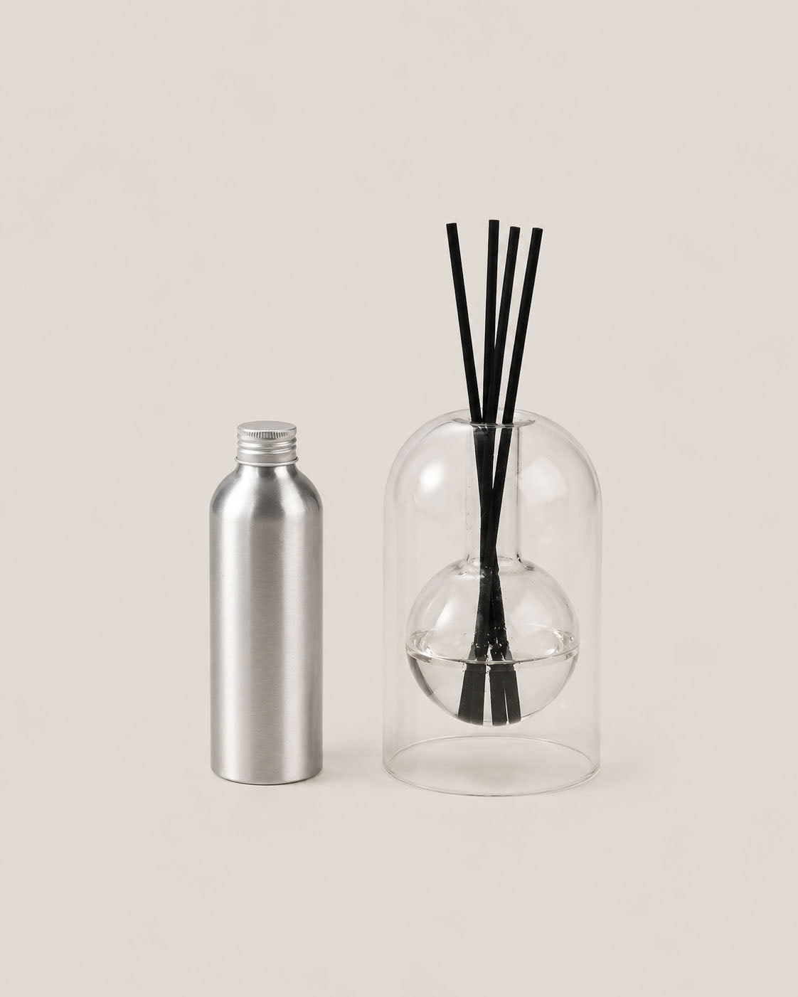 FORM III diffuser by Komo Atelier, black reeds through a glass dome