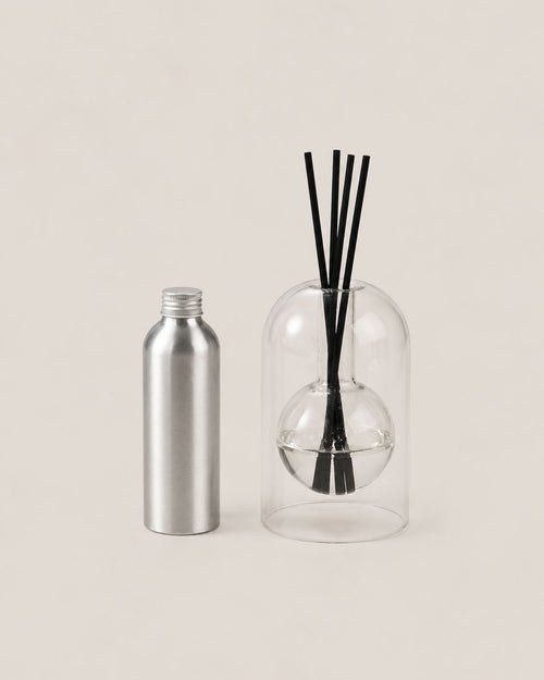 FORM III diffuser by Komo Atelier, black reeds through a glass dome