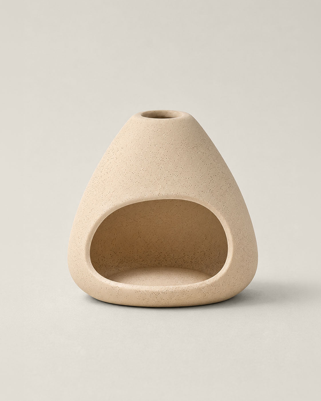 VESSEL oil burner by Komo Atelier, matte ceramic with a triangular hollow form